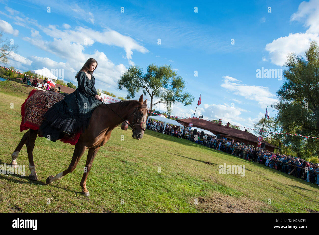 Horse riders in historical costumes during an open-air event in Pultusk ...