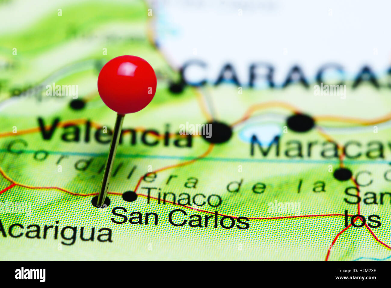 San Carlos pinned on a map of Venezuela Stock Photo