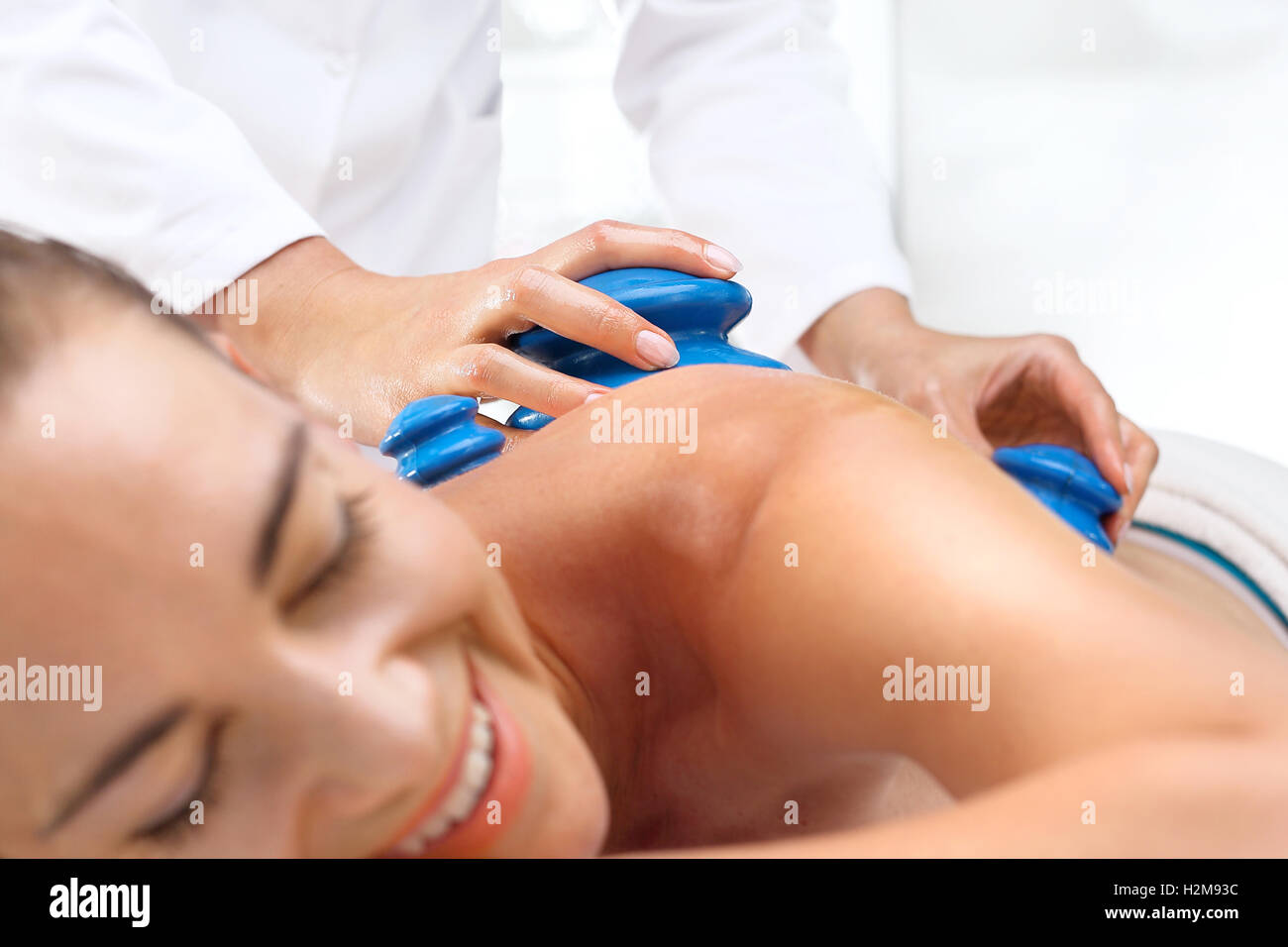 Back massage bubble Chinese. Massage therapy, massage Chinese cupping. Wellness and spa. Massage. Stock Photo