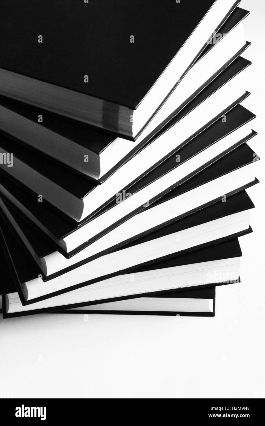 Books built in a pattern isolated on white Stock Photo