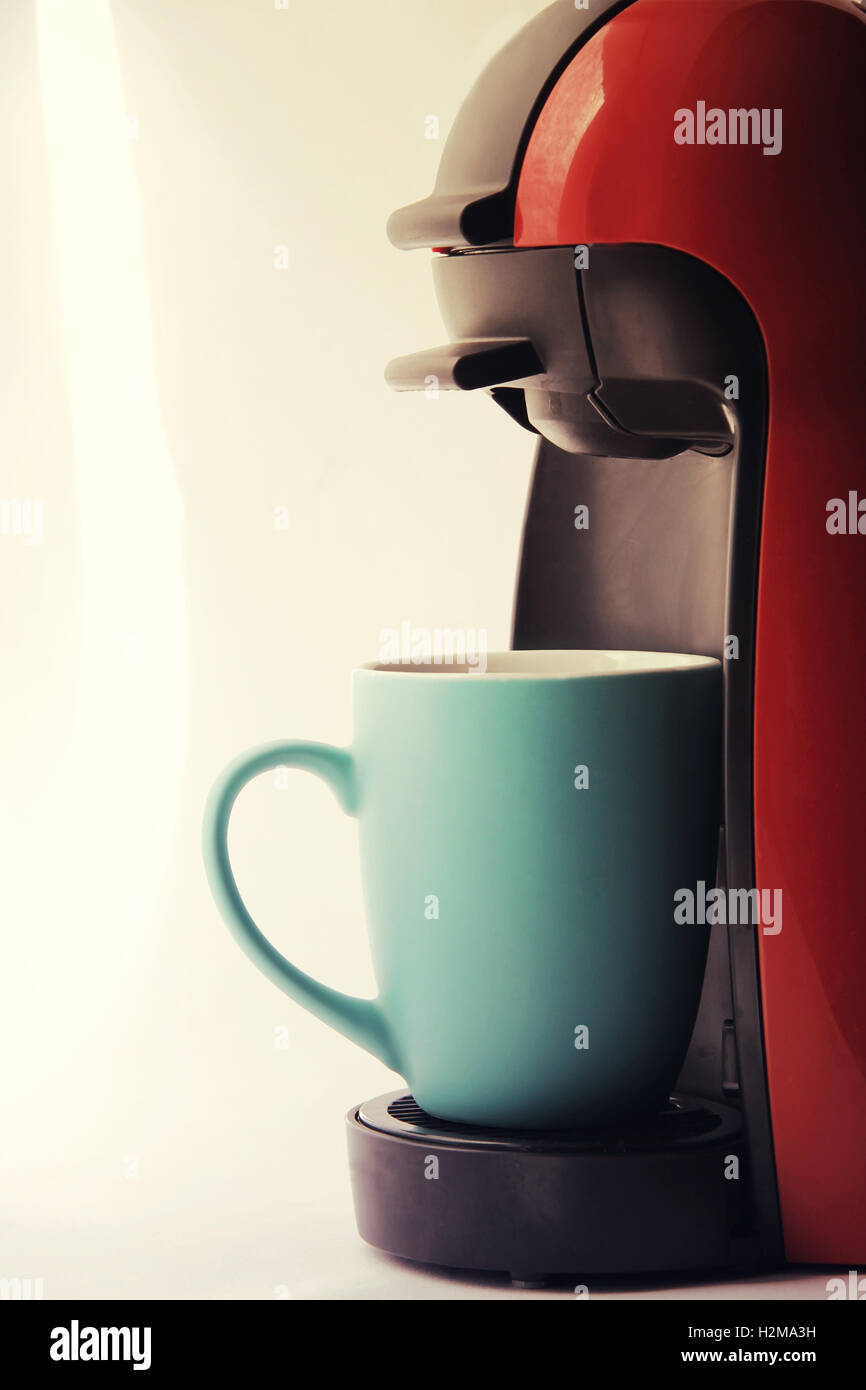 https://c8.alamy.com/comp/H2MA3H/coffee-machine-with-cup-toned-vintage-style-H2MA3H.jpg