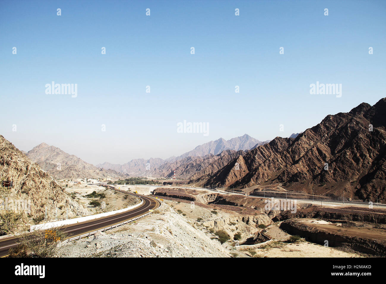 Mountain road in UAE with blue sky Stock Photo