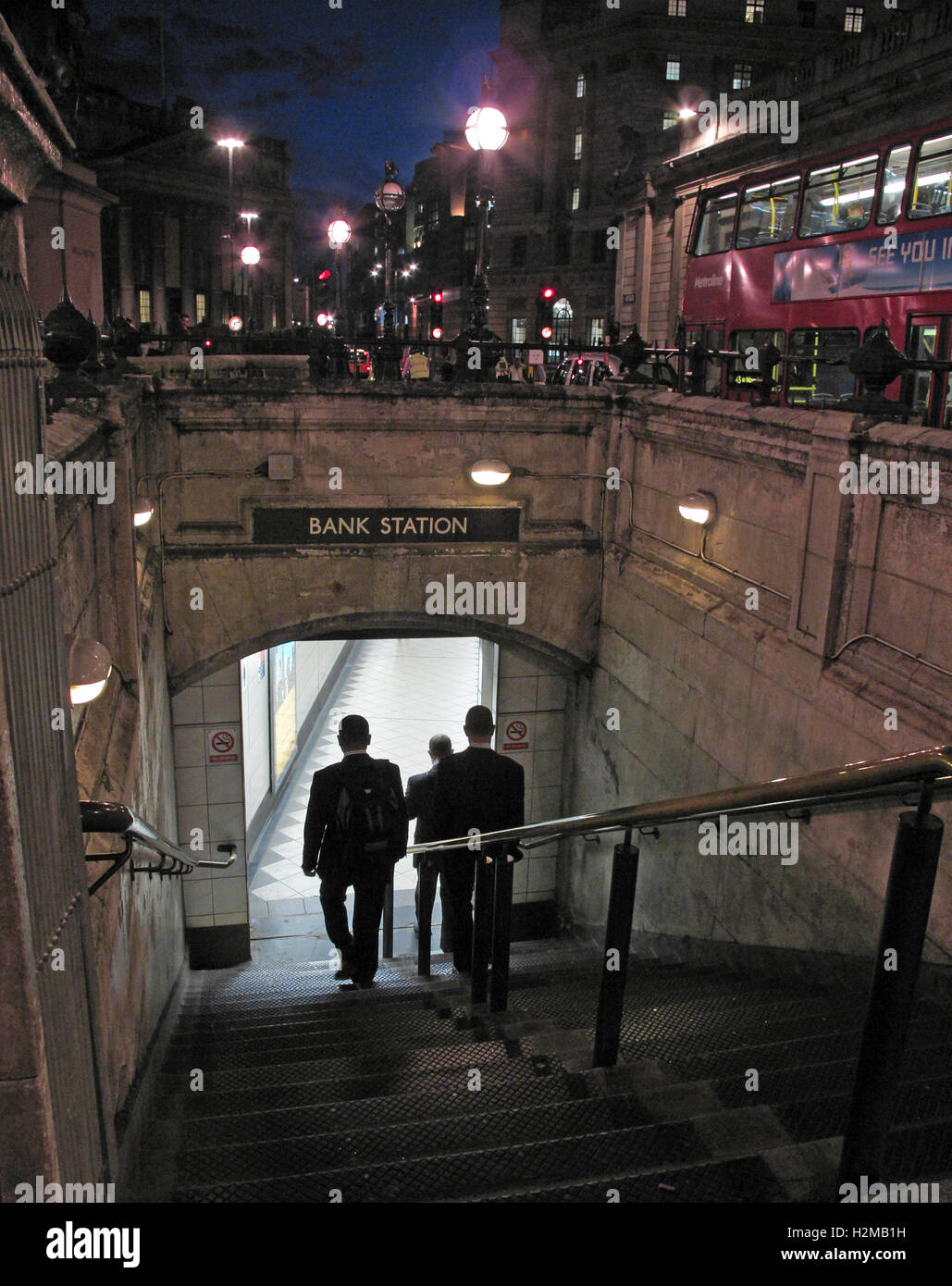Bank Tube Station and passengers, City Of London, at Dusk Stock Photo
