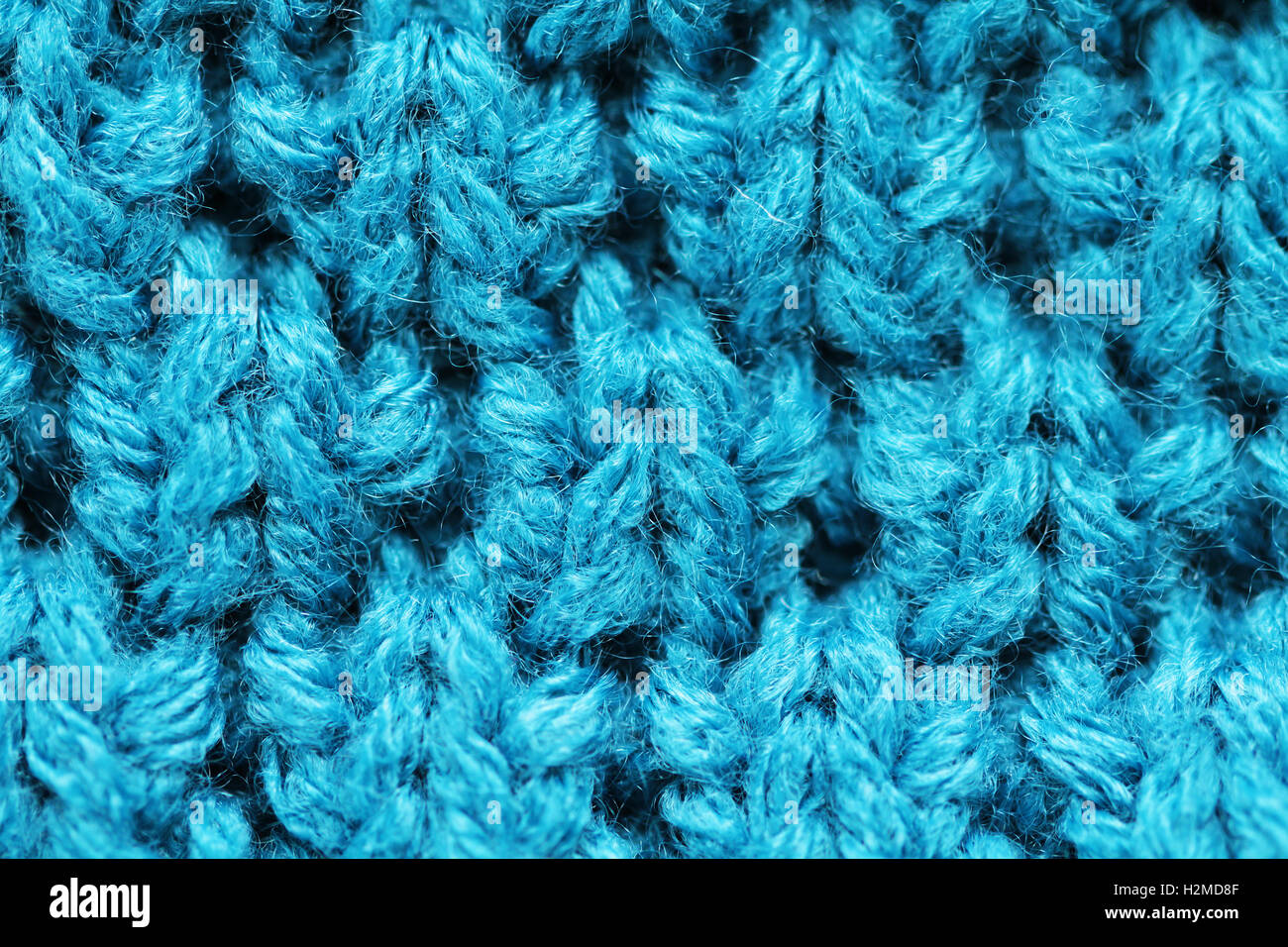 Knitted background close up of blue color Stock Photo - Alamy