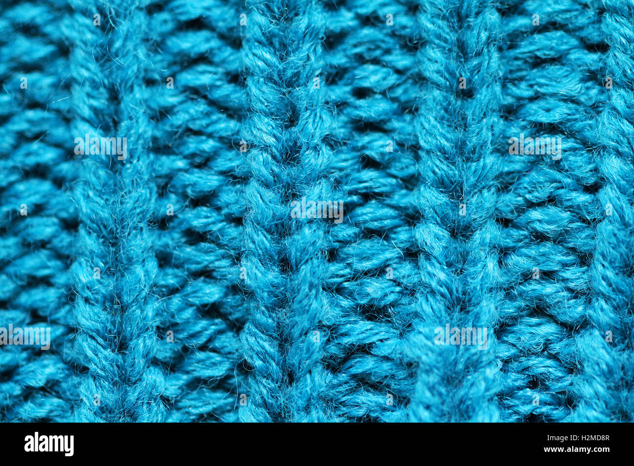 Knitted background close up of blue color Stock Photo - Alamy