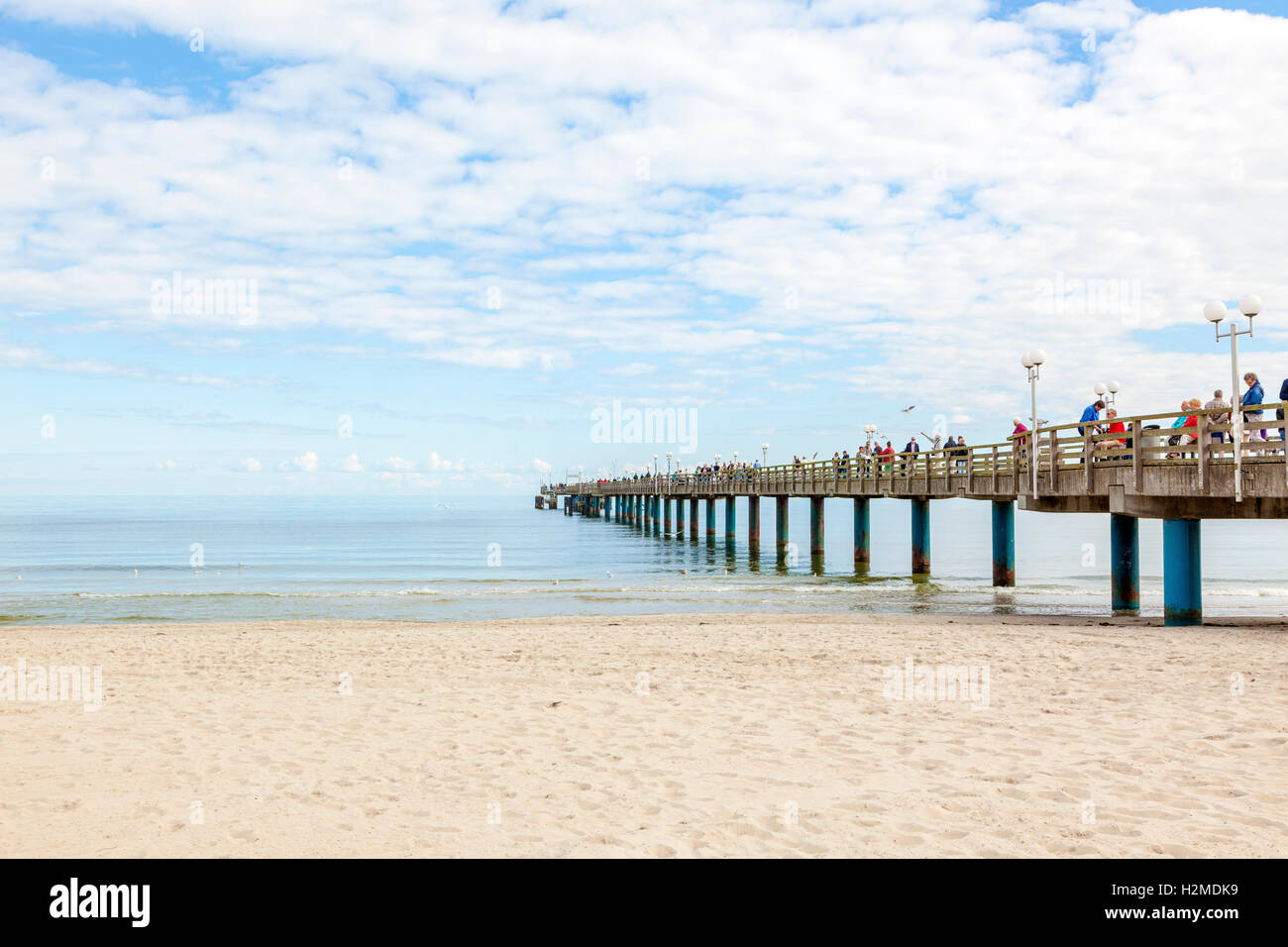 Tourists on the pier at the Baltic Sea beach of Binz, Rugia island Stock Photo