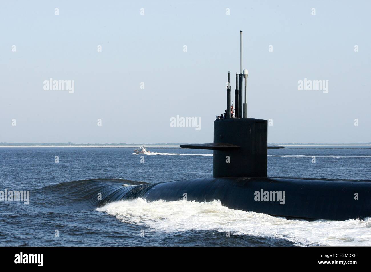 The USN Ohio-class ballistic missile submarine USS Alaska returns to the Naval Submarine Base Kings Bay after a patrol May 22, 2014 in Kings Bay, Georgia. Stock Photo