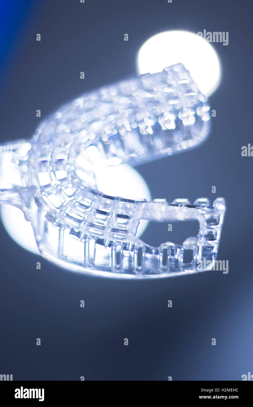 Dentist's plastic dental tooth mold to take impressions of teeth in