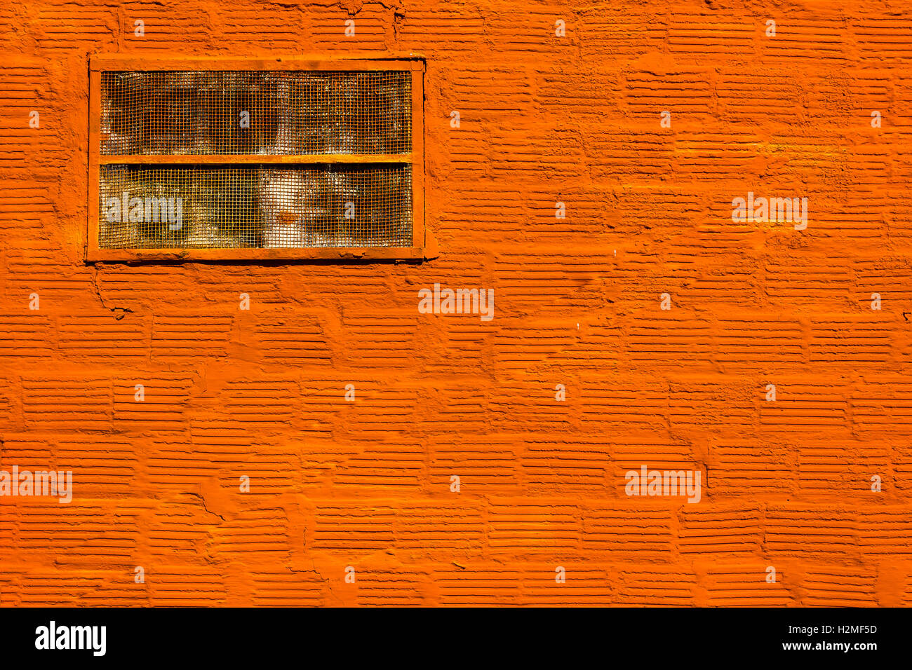 Orange Painted Brick Wall for Background Stock Photo