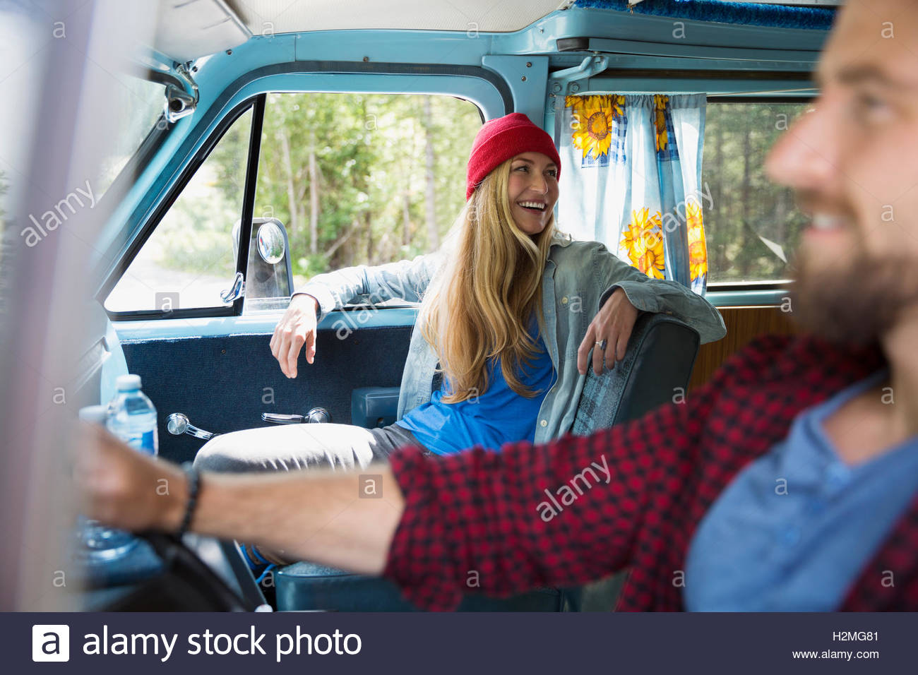 Couple driving and riding in camper van Stock Photo Alamy