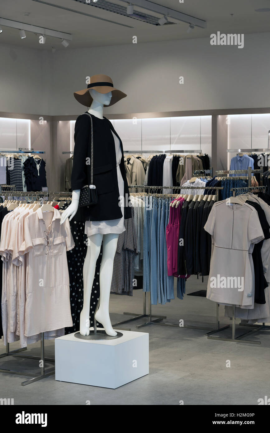 Interior of the womens clothing store with mannequins Stock Photo