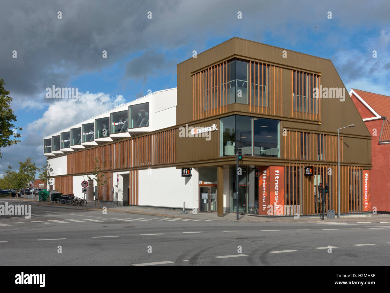 A newly built and awarded building in the town Hørsholm in Denmark containing condos, shops and a Fitness.dk fitness centre. Stock Photo