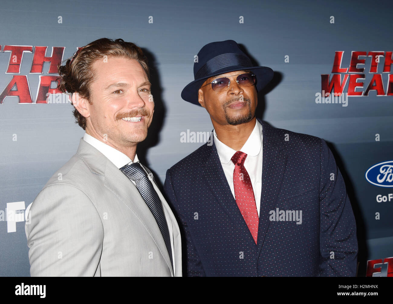 CLAYNE CRAWFORD at left and  Damon Wayans attend the premiere of Fox Network's 'Lethal Weapon' at NeueHouse Hollywood  September 12, 2016 in Los Angeles. Photo Jeffrey Mayer Stock Photo
