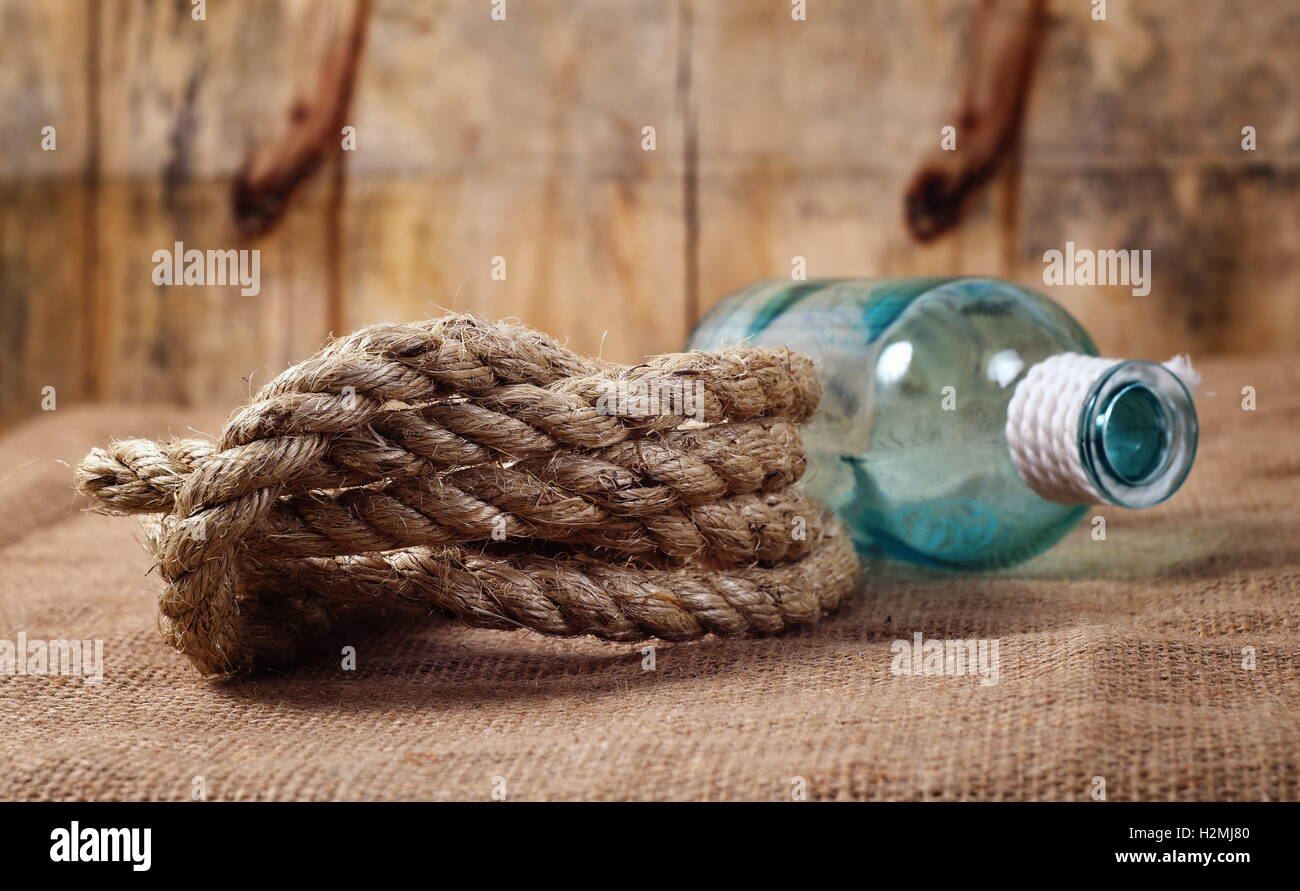 vintage objects,bottle and rope Stock Photo - Alamy