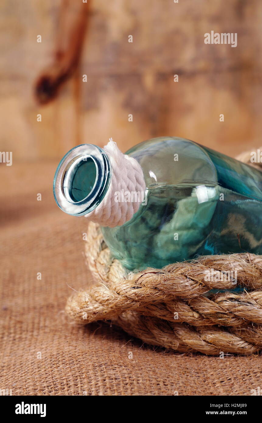 vintage objects,bottle and rope Stock Photo - Alamy