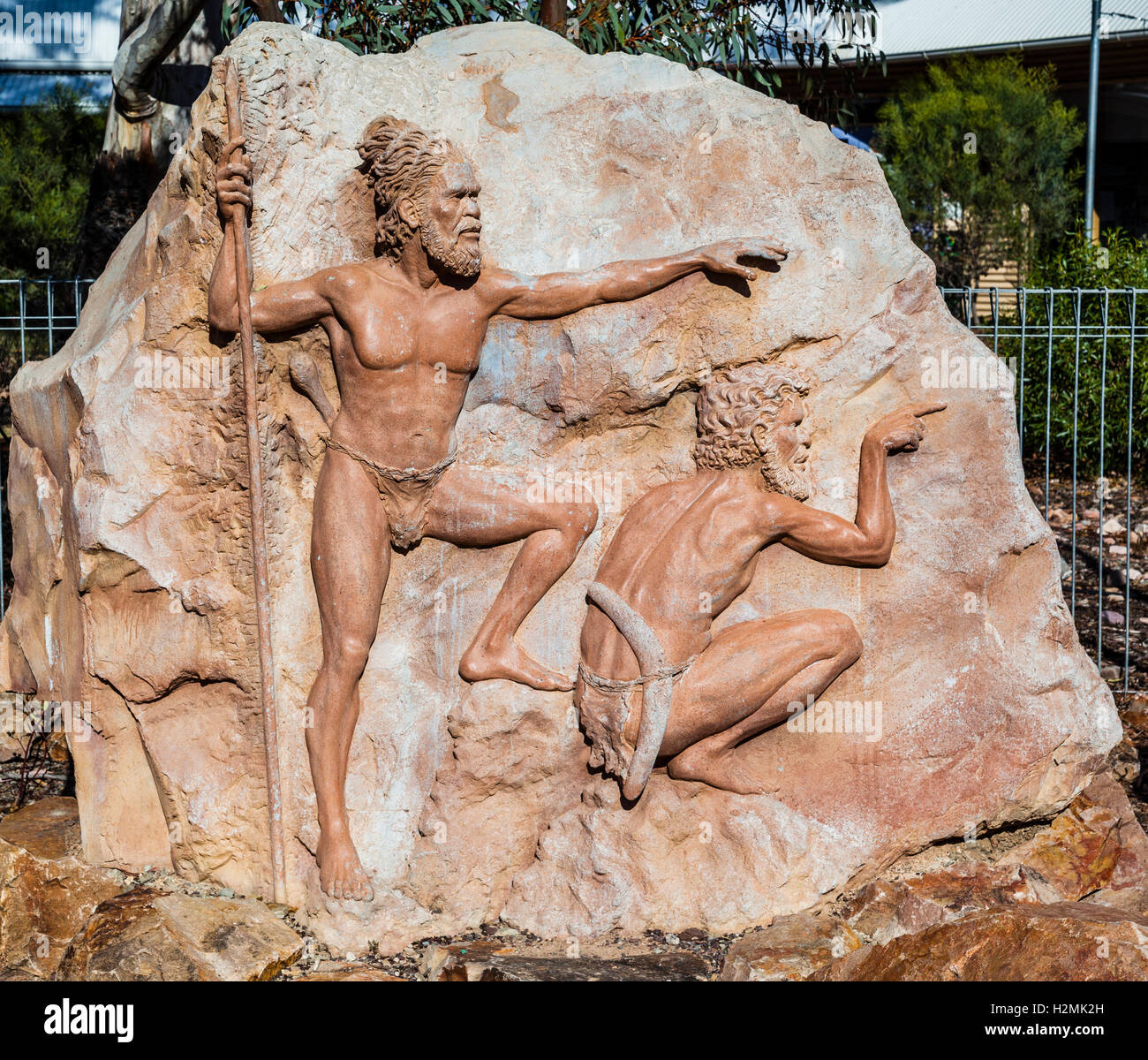 rock carving sculpture of hunting aboriginals at Nepabunna aboriginal settlement, Gammon Ranges, South Australia Stock Photo