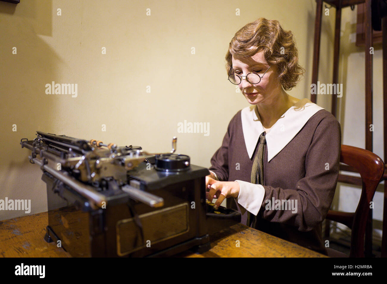 A typist working in railway works administration in Steam museum in