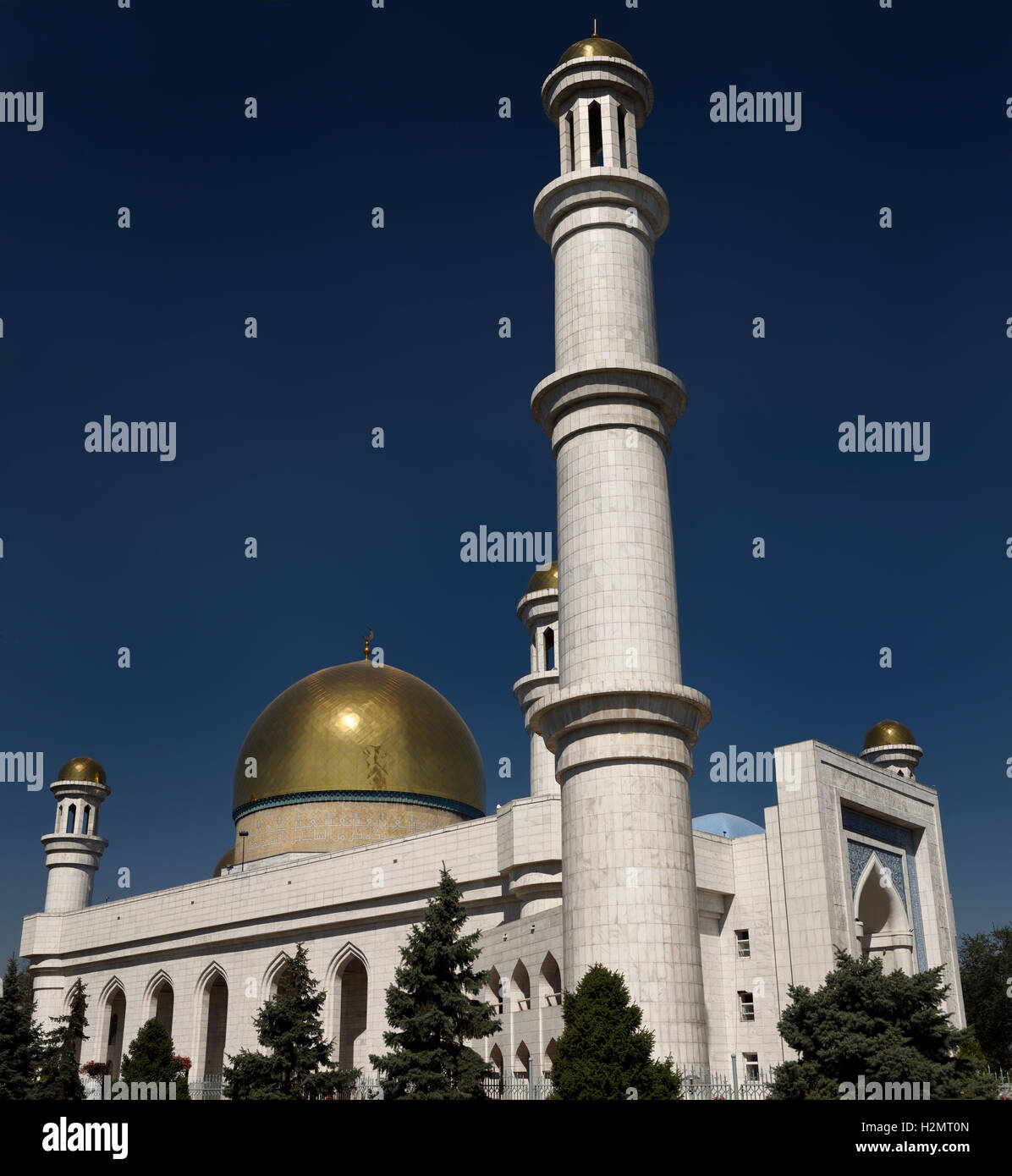 Golden dome and minaret of Central Mosque in Almaty Kazakhstan Stock Photo