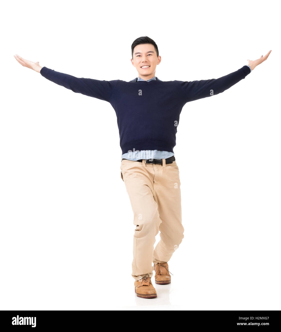 Excited Asian young man Stock Photo - Alamy