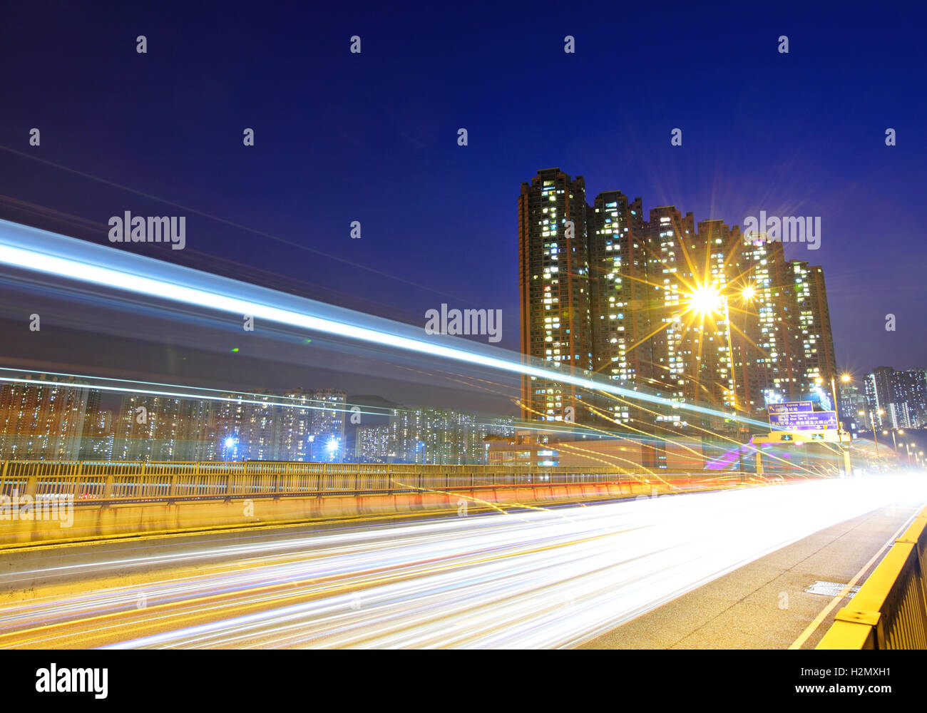 Fast moving traffic in city Stock Photo - Alamy