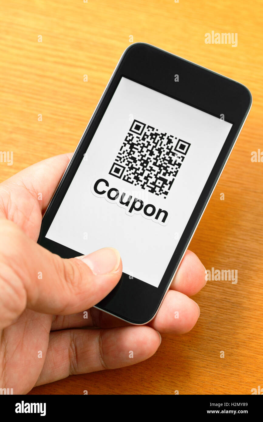 QR code coupon on mobile Stock Photo Alamy