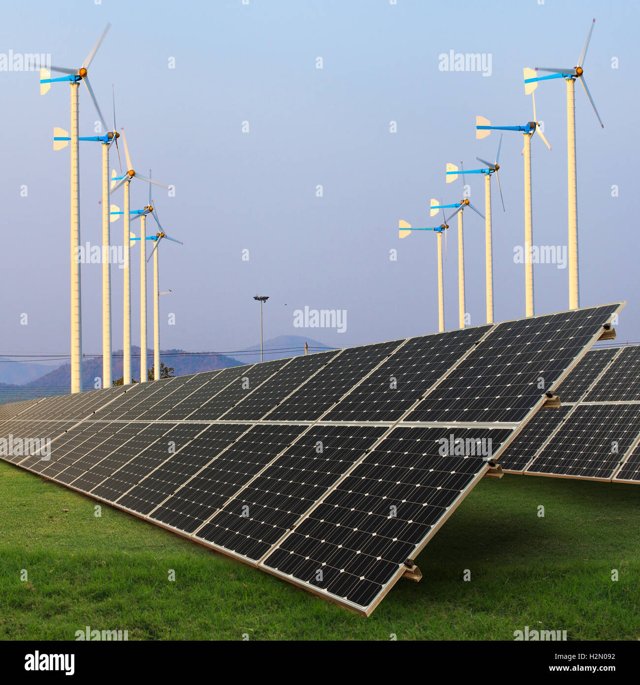 Solar panels on green field Stock Photo