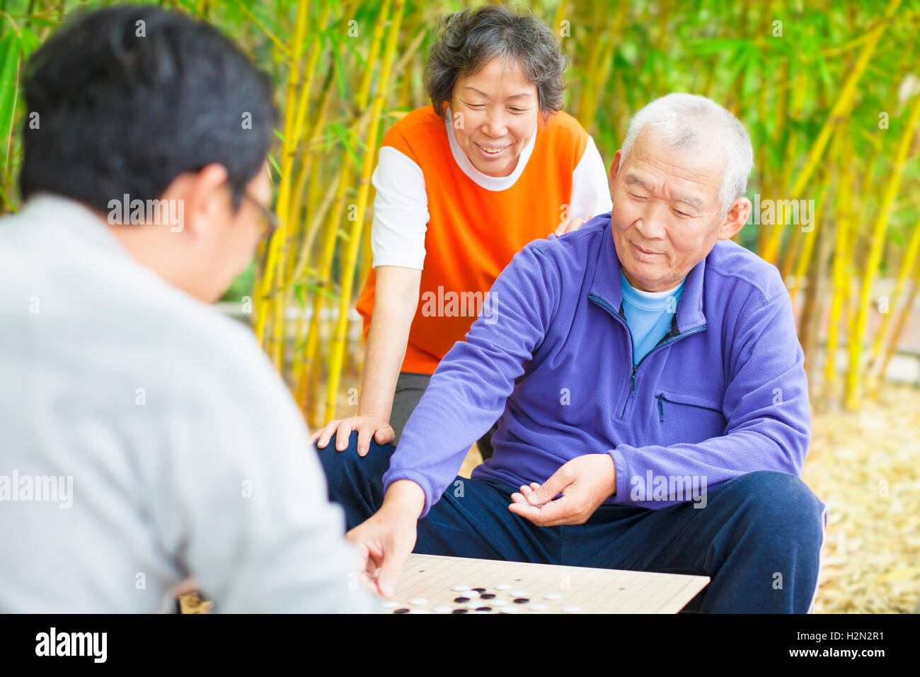 seniors play traditional chinese board game Go Stock Photo Alamy