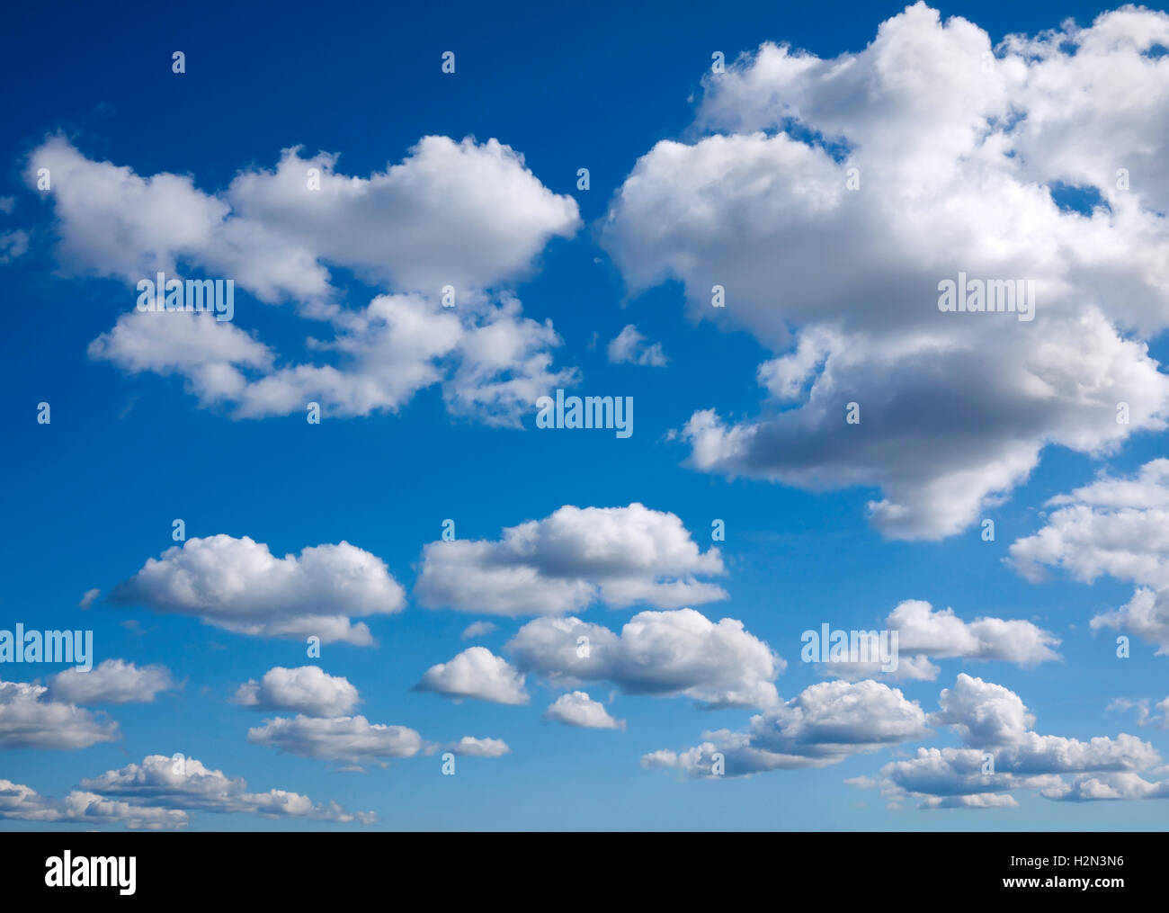 blue sky background with tiny clouds Stock Photo - Alamy