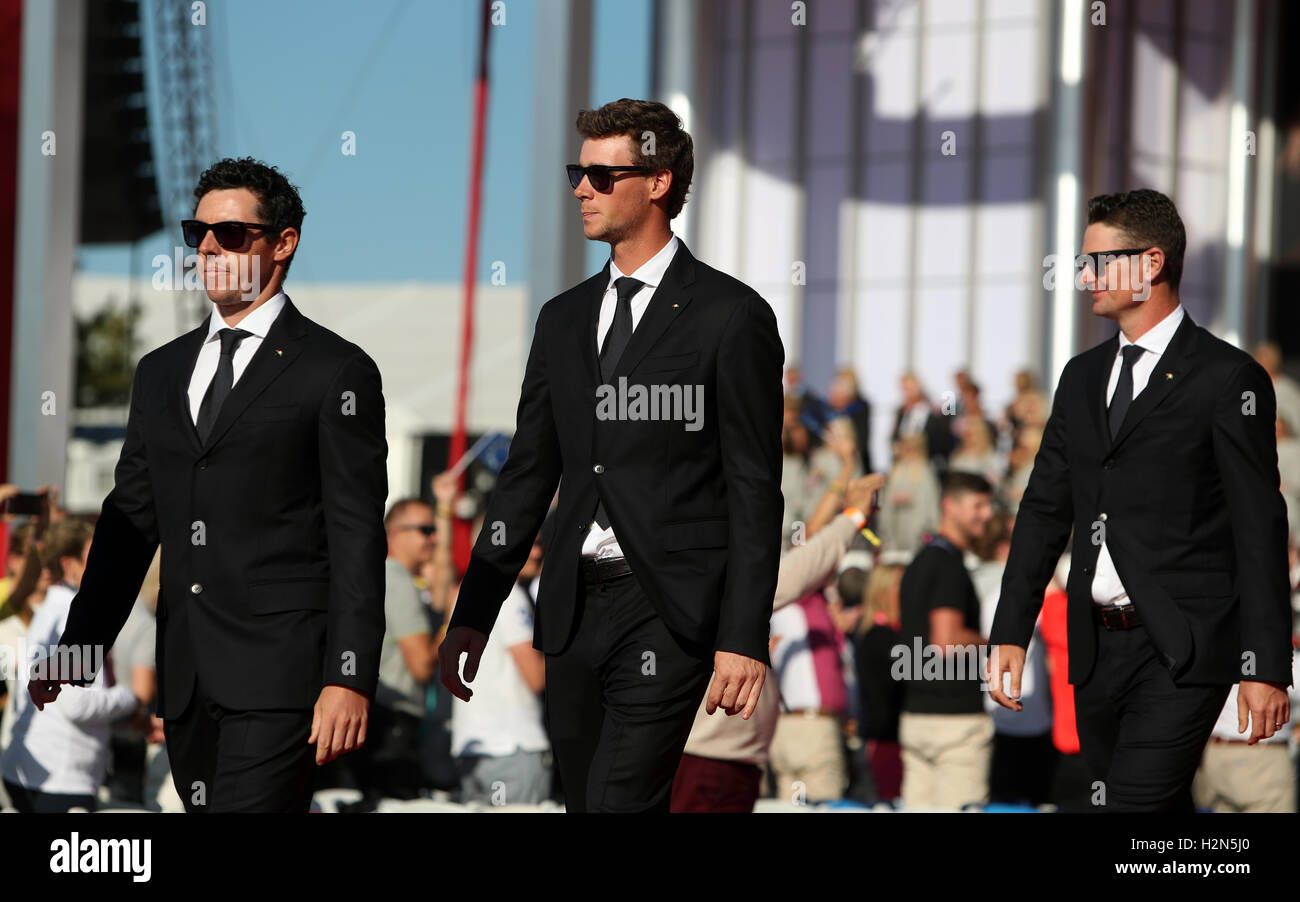(From left to right) Europe's Rory McIlroy, Thomas Pieters and Justin Rose walk out during the opening ceremony for the 41st Ryder Cup at Hazeltine National Golf Club in Chaska, Minnesota, USA. Stock Photo