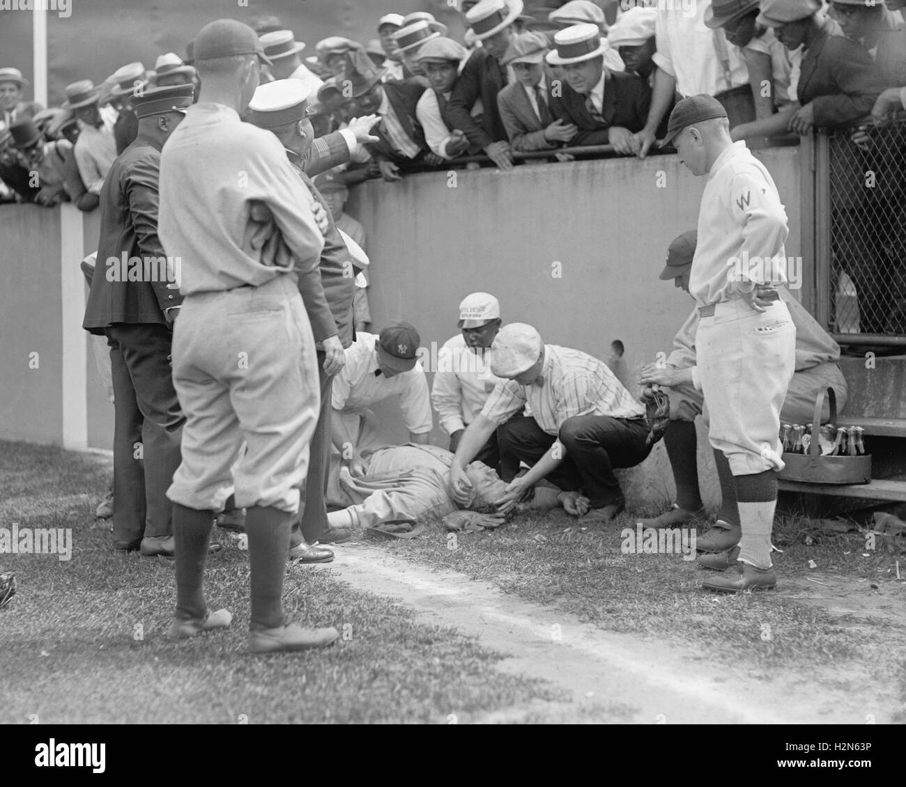 Babe Ruth, Major League Baseball Player, New York Yankees, Knocked out in front of Segregated Section of Fans during Ball Game, Washington DC, USA,  National Photo Company, July 6, 1924 Stock Photo