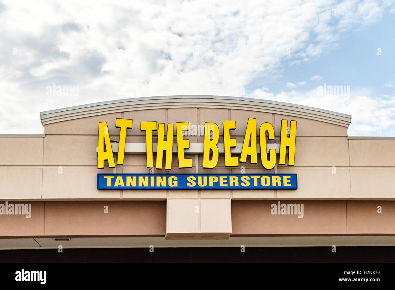 The exterior logo and sign of At The Beach a tanning superstore located at 2108 SW 74th, Oklahoma City, Oklahoma, USA. Stock Photo