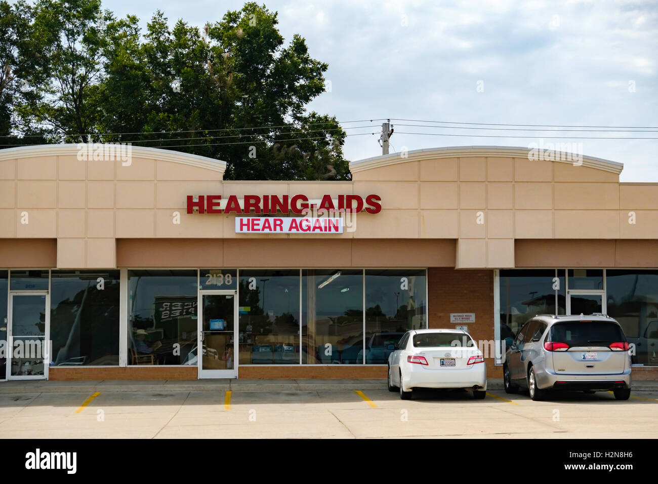 The storefront of Hear Again, a hearing aid business at 2138 W. Interstate 240 service road in Oklahoma City, Oklahoma, USA. Stock Photo