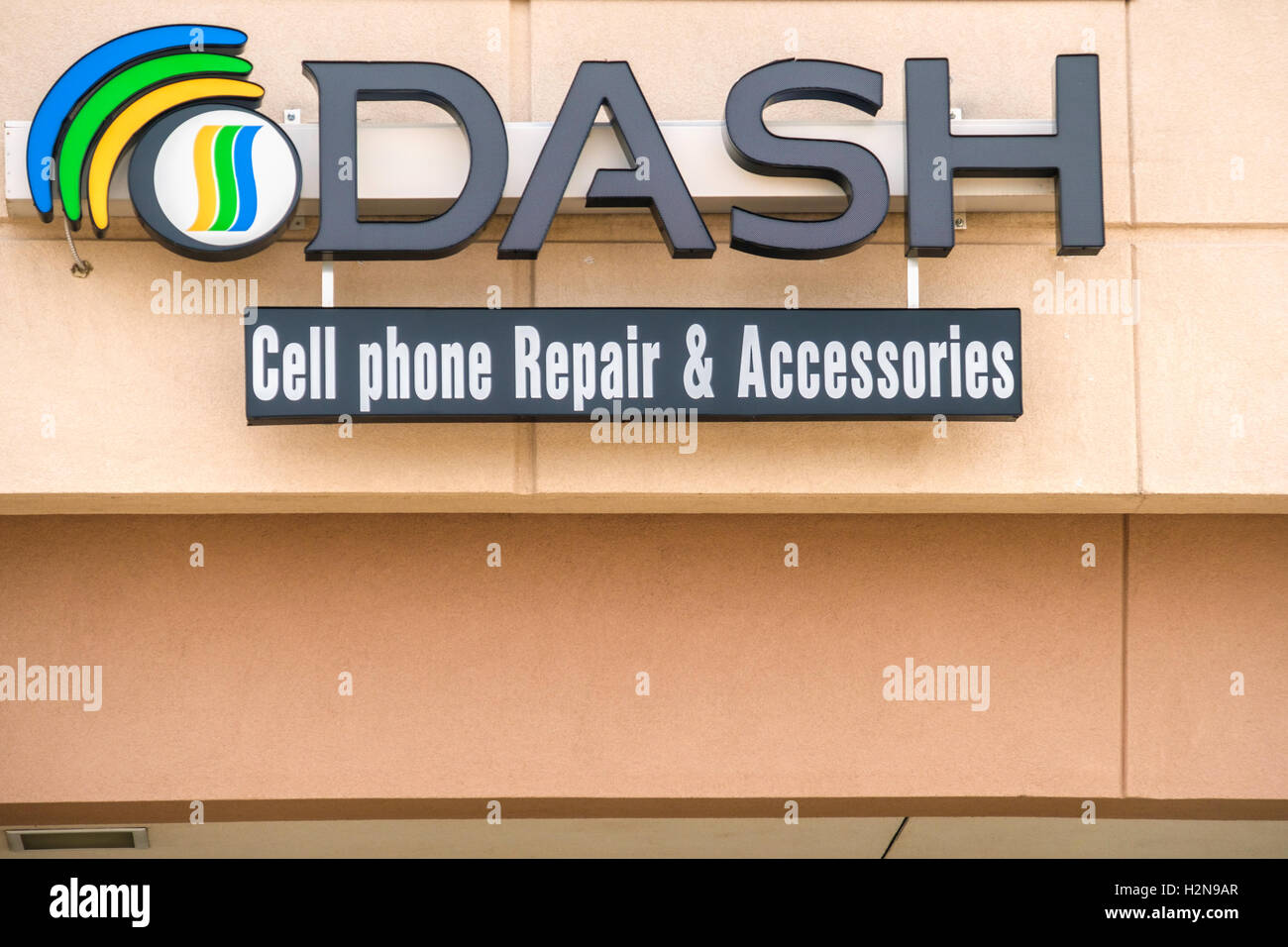 The exterior name and logo of DASH, an electronic repair shop, 2112 SW 74th, Oklahoma City, Oklahoma, USA. Stock Photo