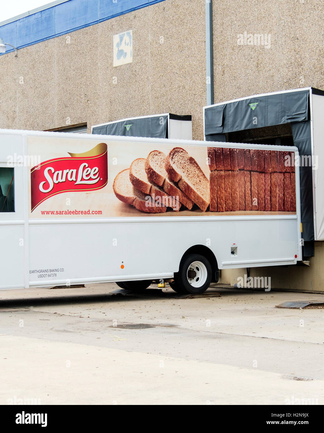 A SaraLee delivery truck backed up to a loading dock in Oklahoma City, Oklahoma, USA. Stock Photo