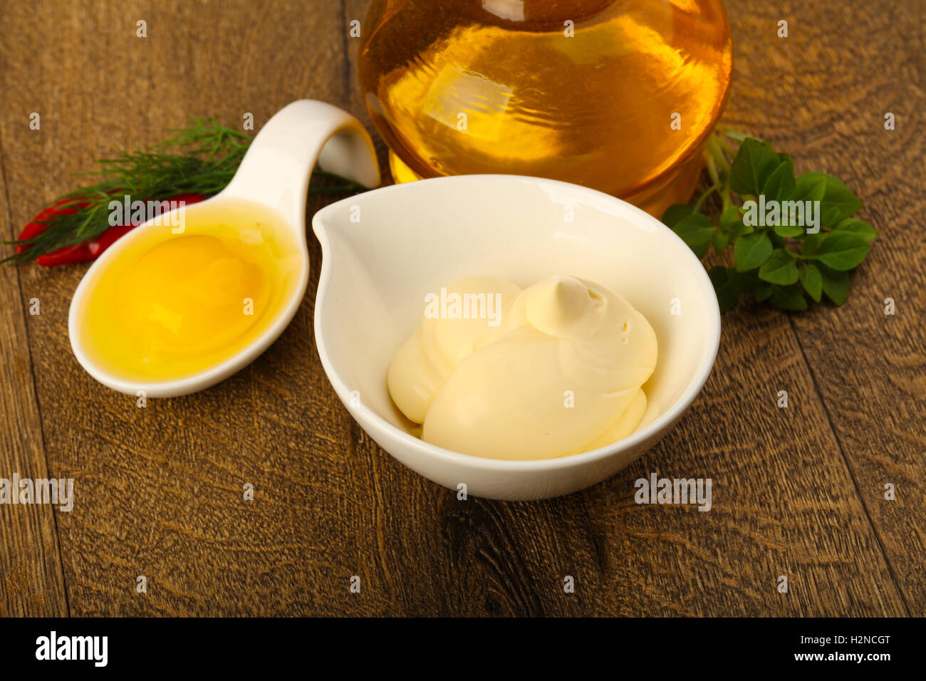 Homamade Mayonnaise with egg and oil in bottle Stock Photo Alamy