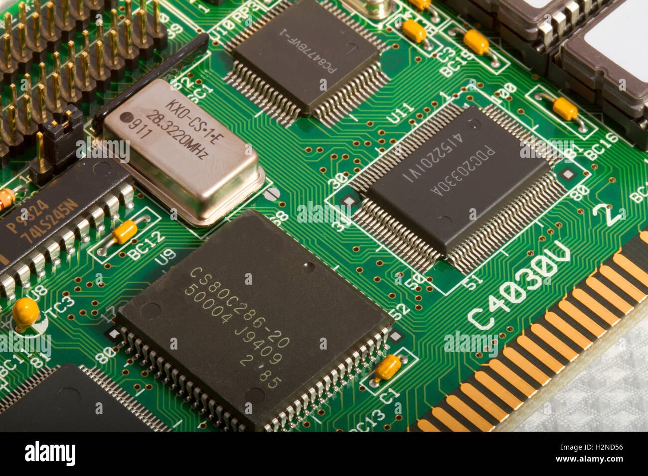 Electronic printed circuit board with components Stock Photo