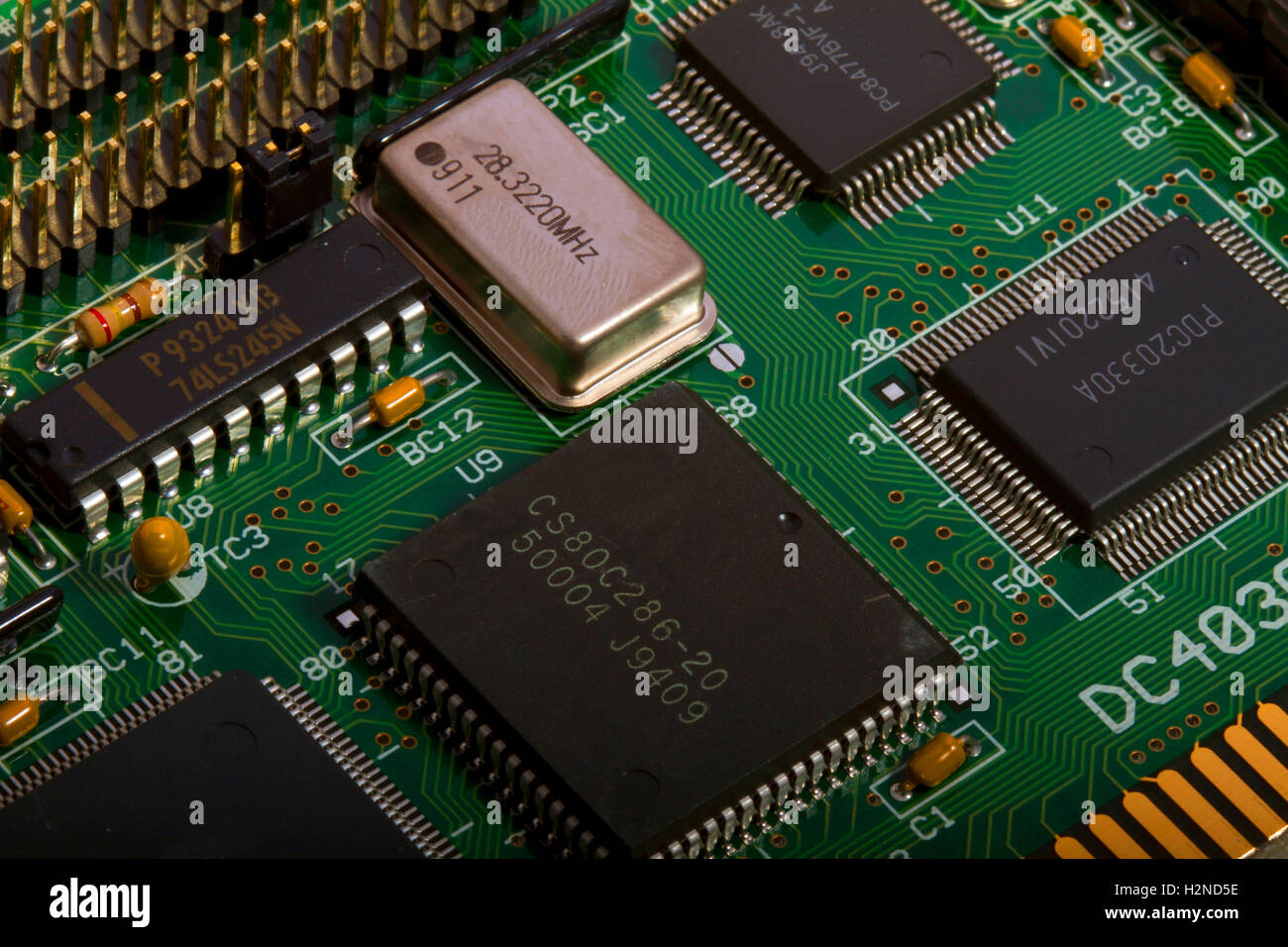 Electronic printed circuit board with components Stock Photo