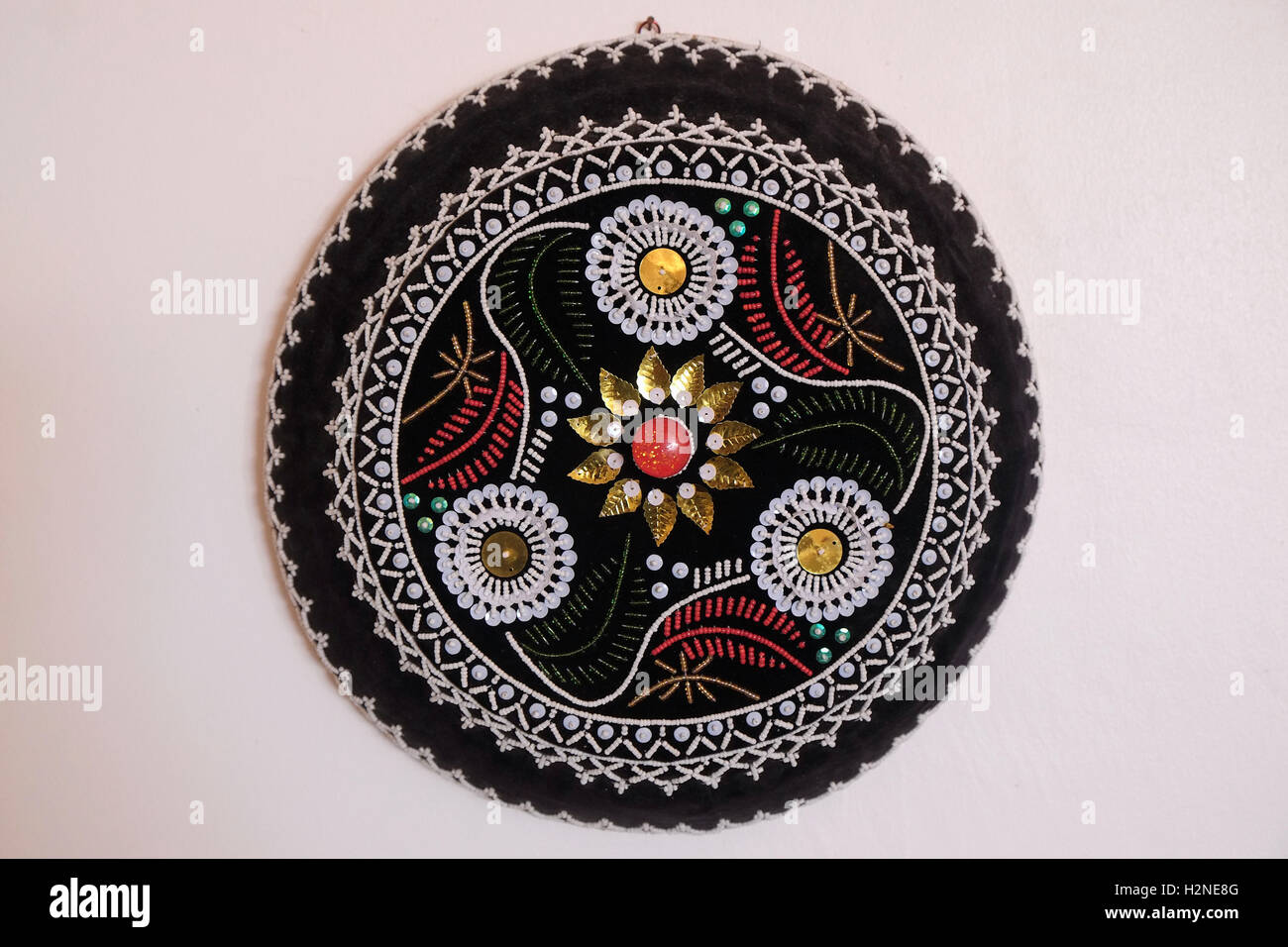 Traditional embroidered Muslim kofia rounded cap in Zanzibar island a semi-autonomous part of Tanzania, in East Africa Stock Photo