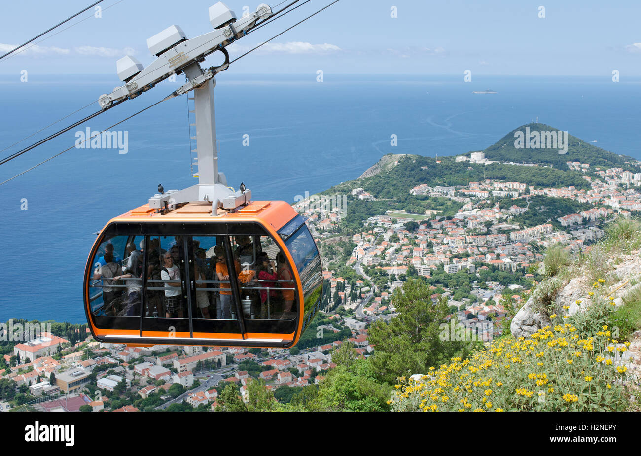 Dubrovnik Croatia - Tourists in a cablecar above the old town of Dubrovnik Stock Photo