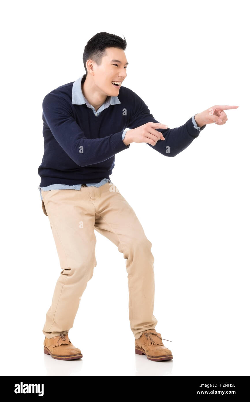 Excited Asian young man Stock Photo - Alamy