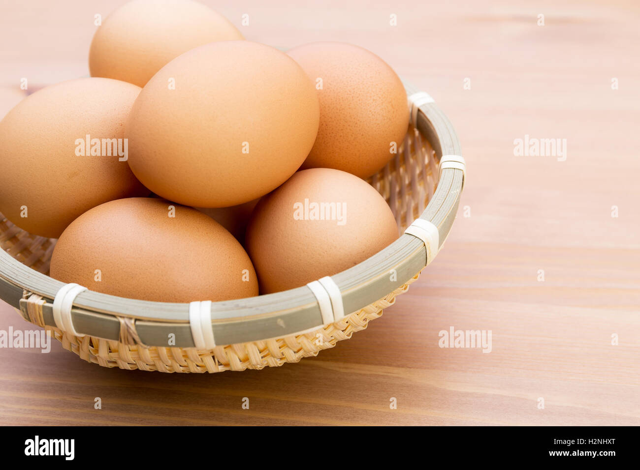 Egg in basket Stock Photo Alamy