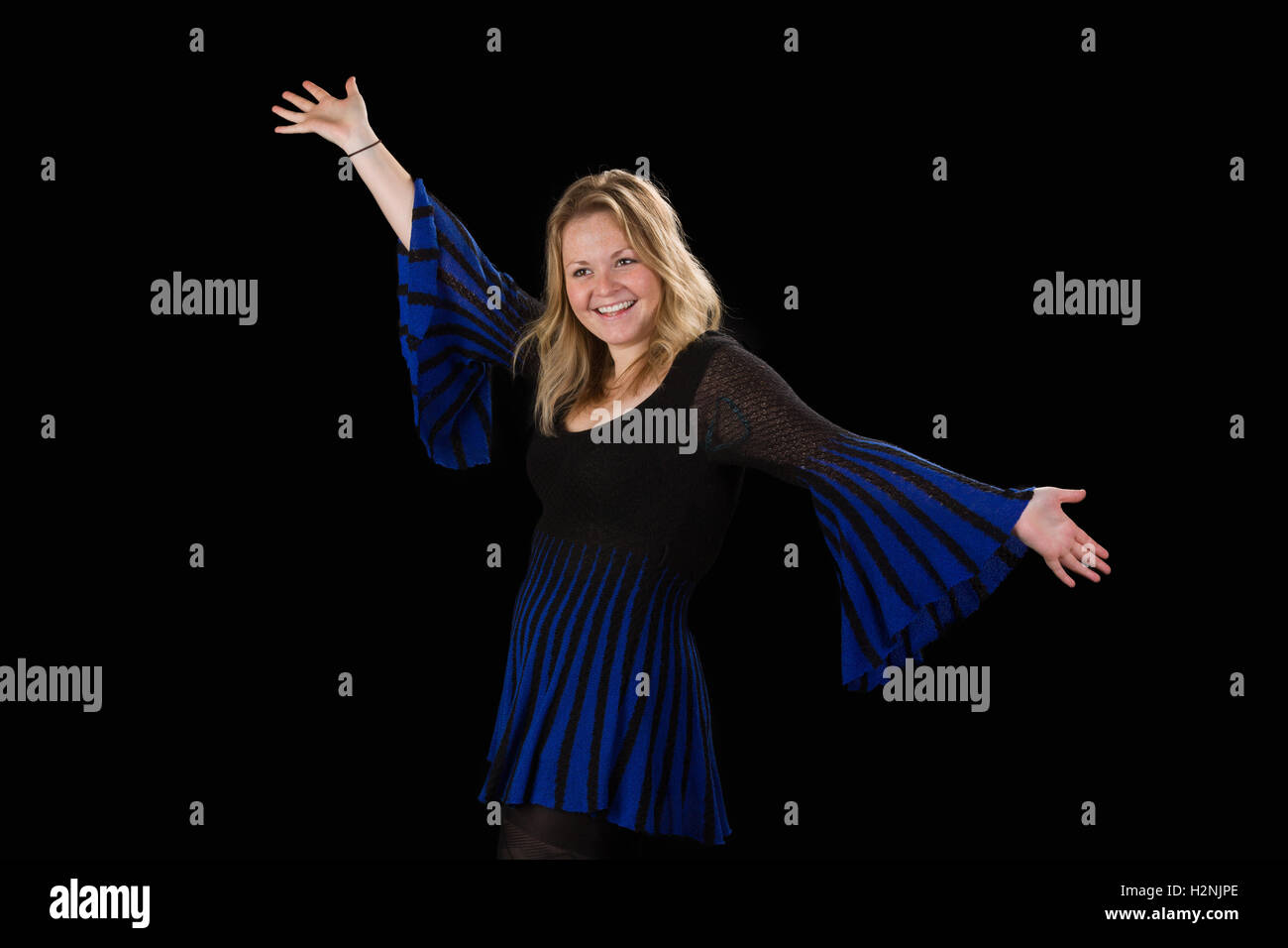 Woman blonde in blue dress hi-res stock photography and images - Alamy