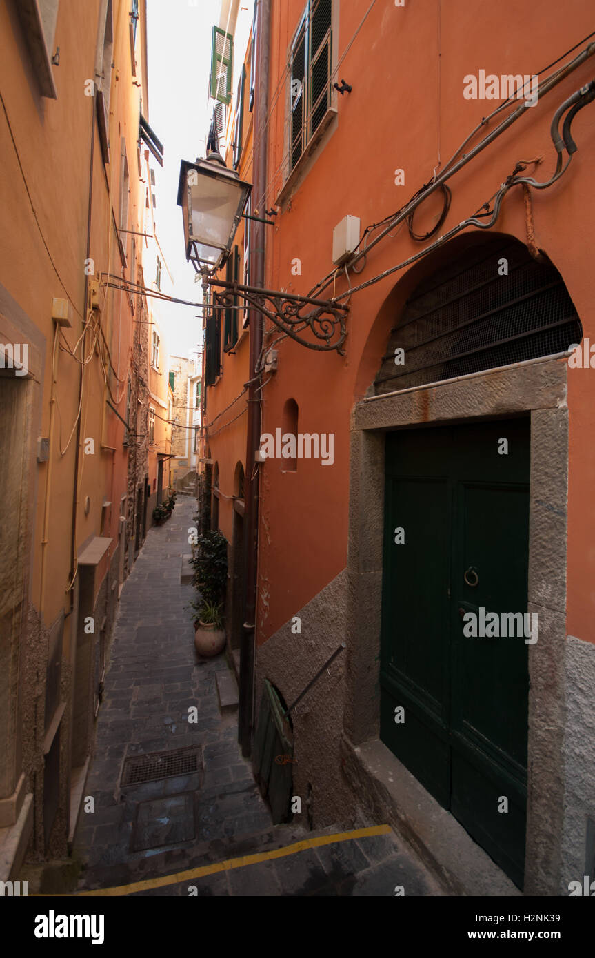 An example of the narrow walkways that are typical of Mediterranean villages, Riomaggiore, Cinque Terre, Liguaria, Italy, Stock Photo