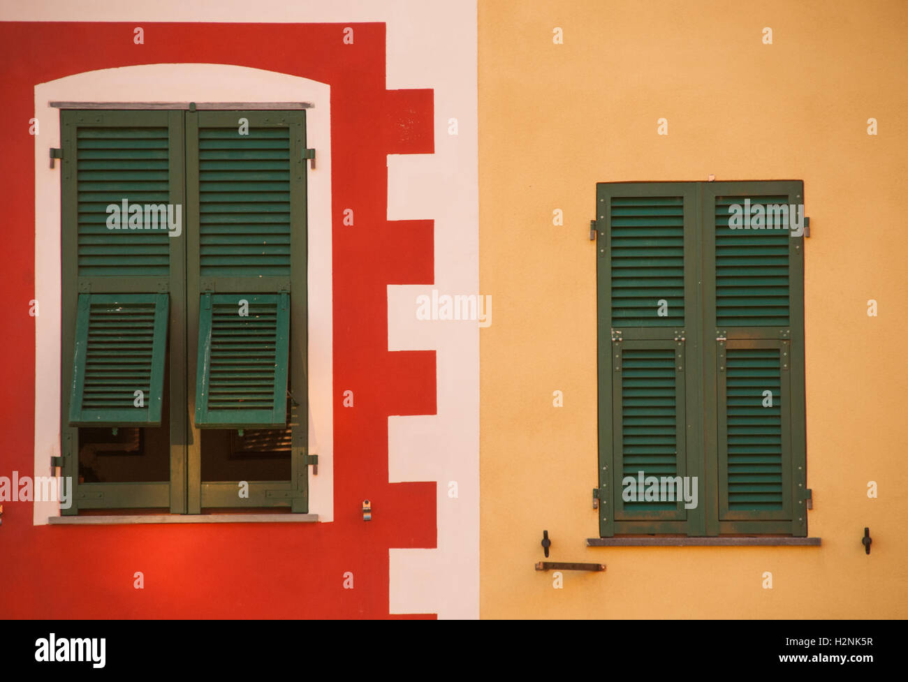 Traditionally styled window, typically coloured to those buldings found in the Cinque Terre area, Riomaggiore, Liguaria, Italy, Stock Photo