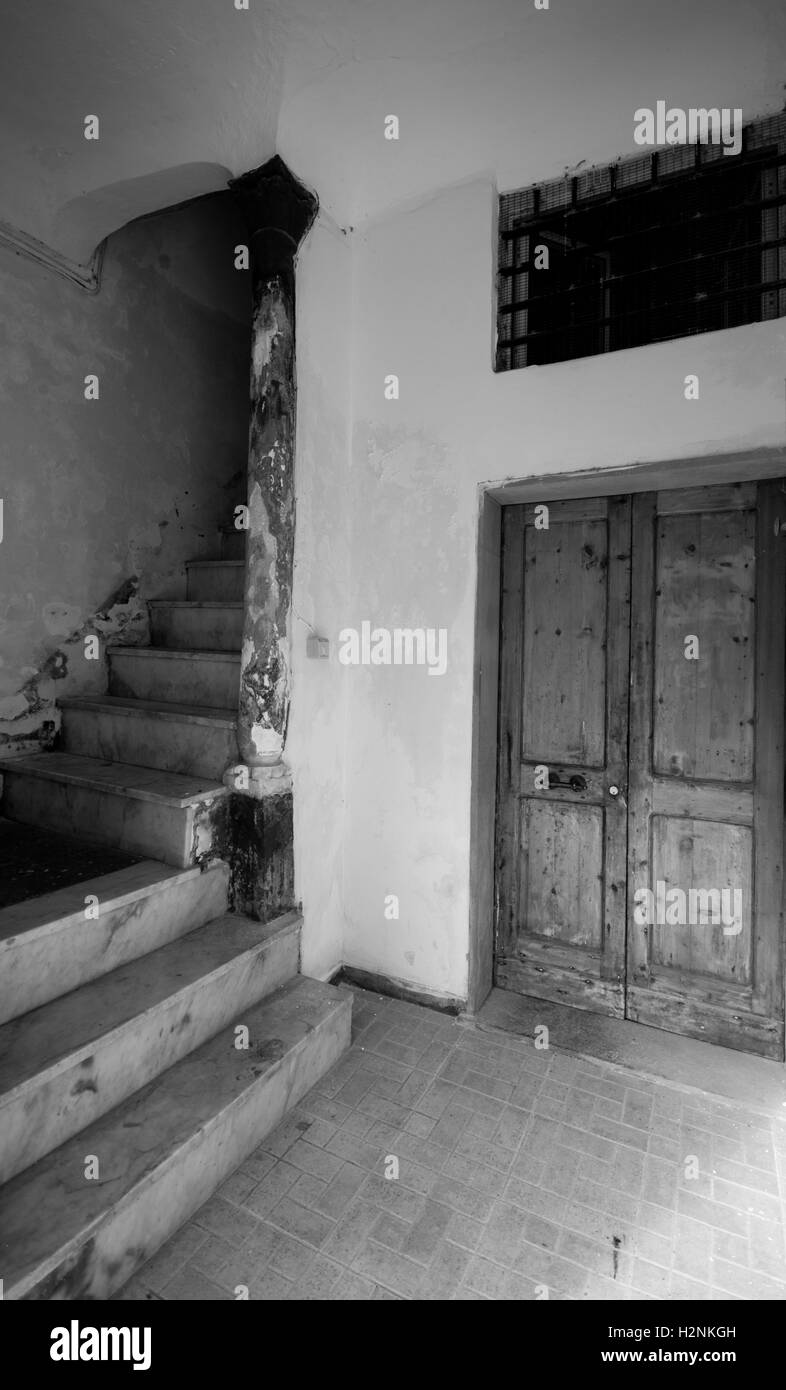 An old concrete staircase and doorway, Montorosso Al Mare, Cinque Terre, Italy, Liguaria, September. Black and white conversion. Stock Photo