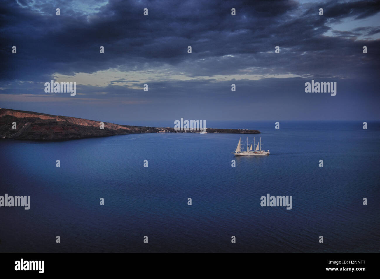 Ship sailin by Oia Santorini island Greece Stock Photo - Alamy