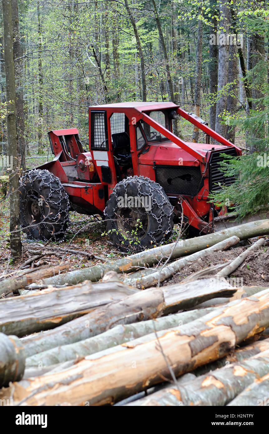 Cable skidder and logs Stock Photo - Alamy
