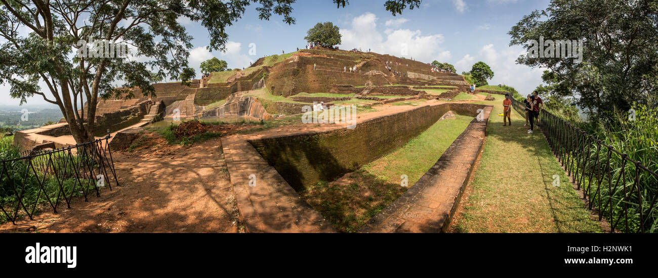 The remains of the palace complex at Sigiriya (the Lion Rock), some walls remain, a reservoir, many thousands of bricks Stock Photo