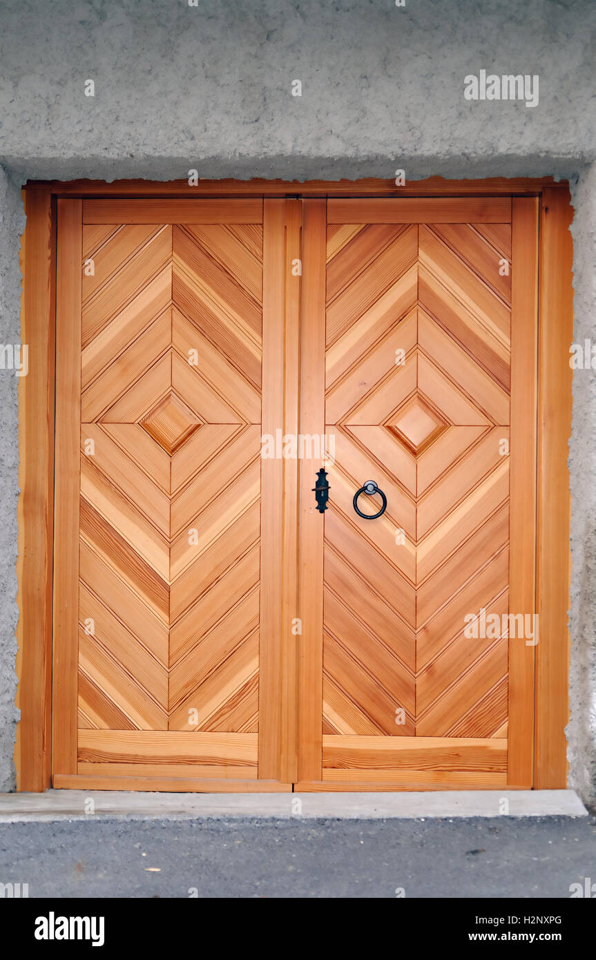 Stylish wooden door made from Douglas fir (Pseudotsuga menziesii). Stock Photo