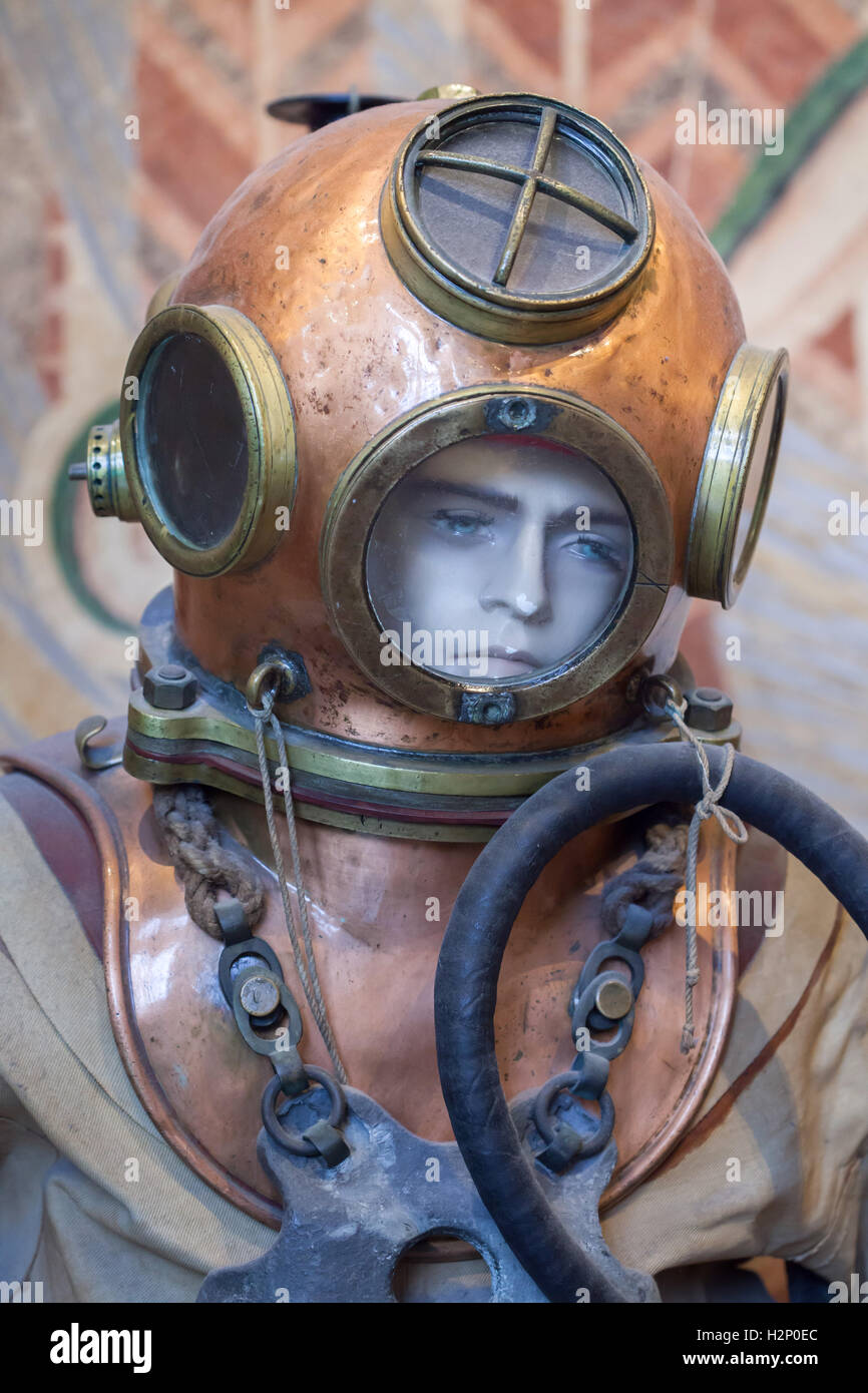 Old atmospheric diving suit from the 1910s displayed in the Musee de la